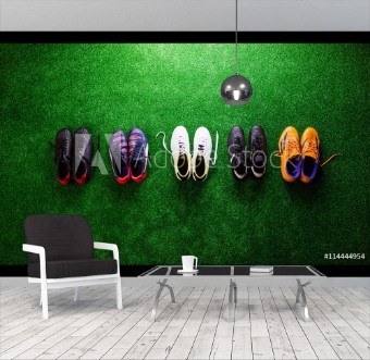 Picture of Various cleats against green artificial turf studio shot